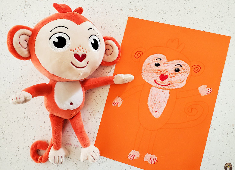 Makoo dessiné sur une feuille A4 orange